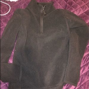 top. small zip up no hood black
